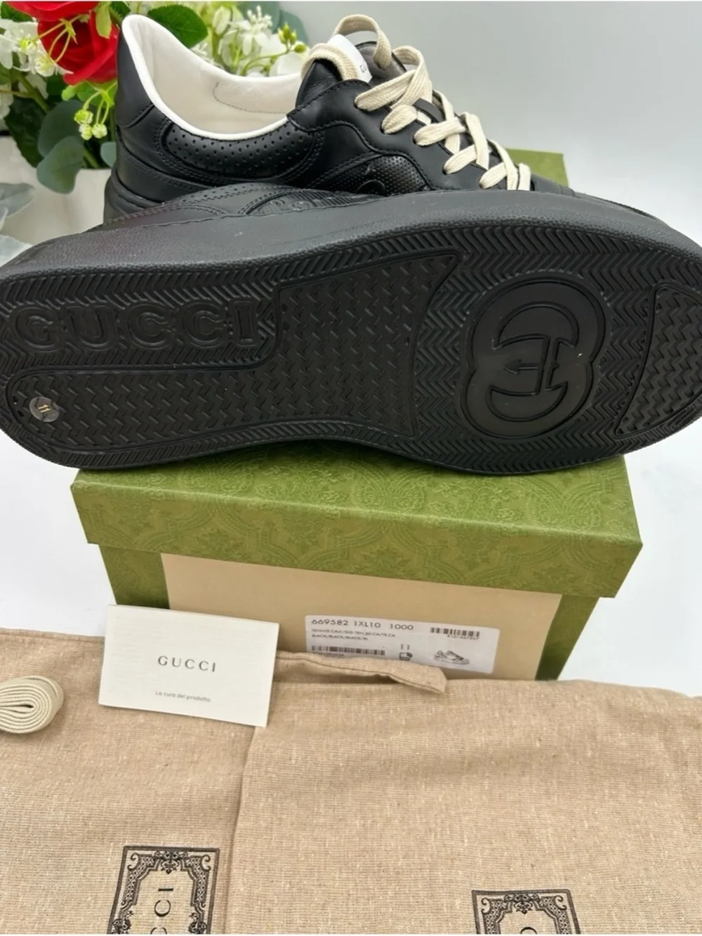Gucci, GG embossed, black leather sneakers size 11 fits 11.5 made in Italy